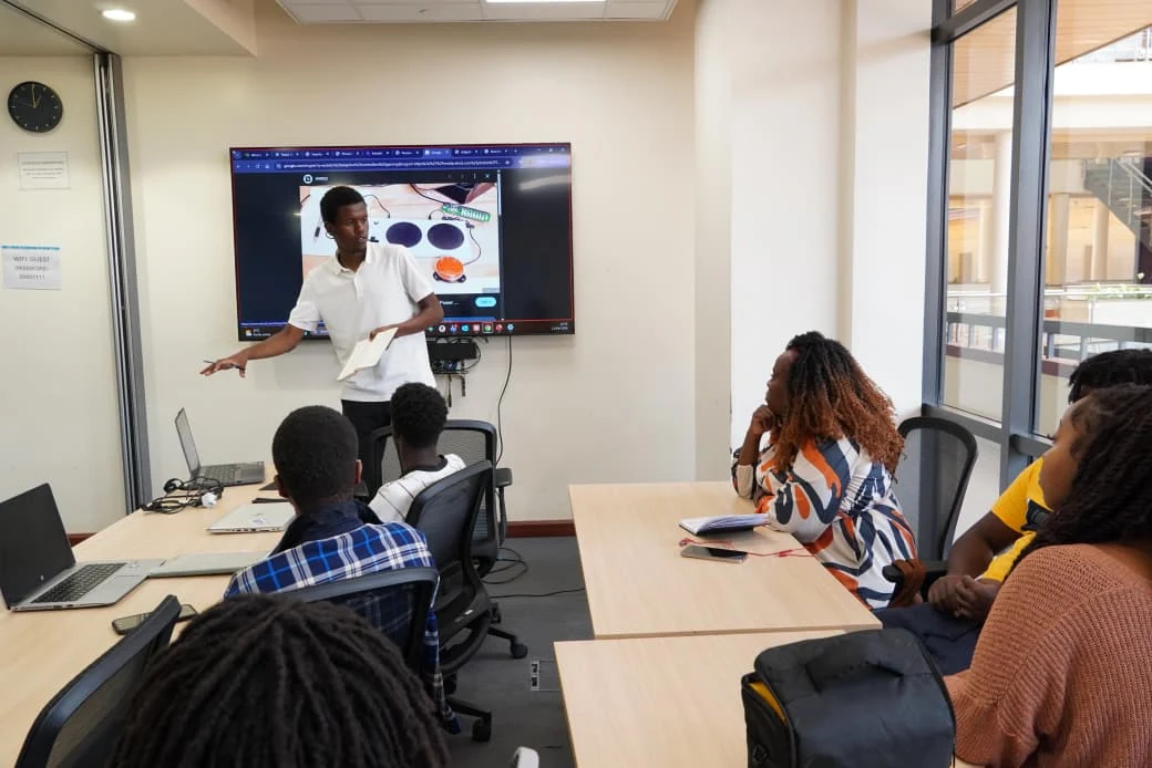 A student presenting prototype progress at the halfway review