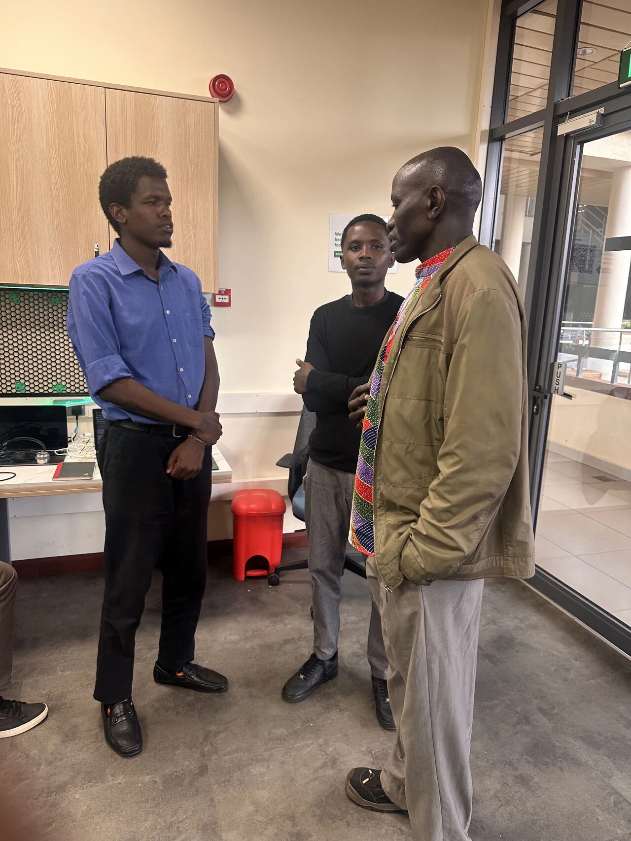 Students in conversation with a mentor